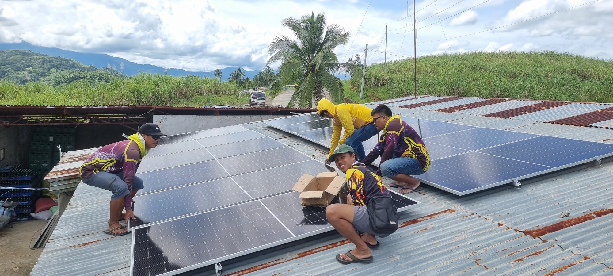 JDL Wireless professional team installing solar panels on residential roof in Philippines