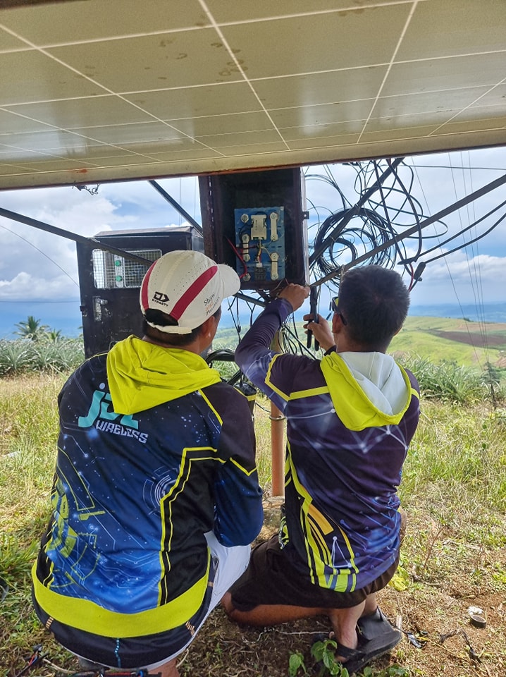 JDL Wireless technicians installing wireless equipment and network infrastructure in Philippines